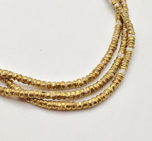 Load image into Gallery viewer, Ethiopian strand of Heishi Brass Beads
