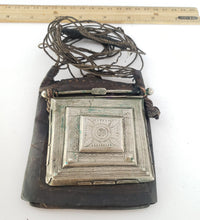 Load image into Gallery viewer, Tuareg Silver on Leather Gris Gris hand engraved amulet pendant leather cord necklace,Tuareg jewelry ,Sahara jewelry ,moroccan jewelry
